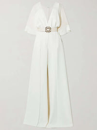 White dress with a gold belt on a light gray background