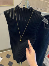 Casual summer knit top styled with denim