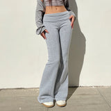 Flared trousers in solid color for women
