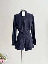 High-waist tailored shorts with belt loops close-up