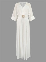 White dress with a belt on a gray background