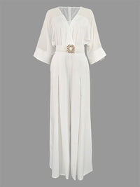 White dress with a belt on a gray background