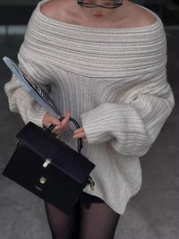 Women’s elegant off‑shoulder knit pullover styled